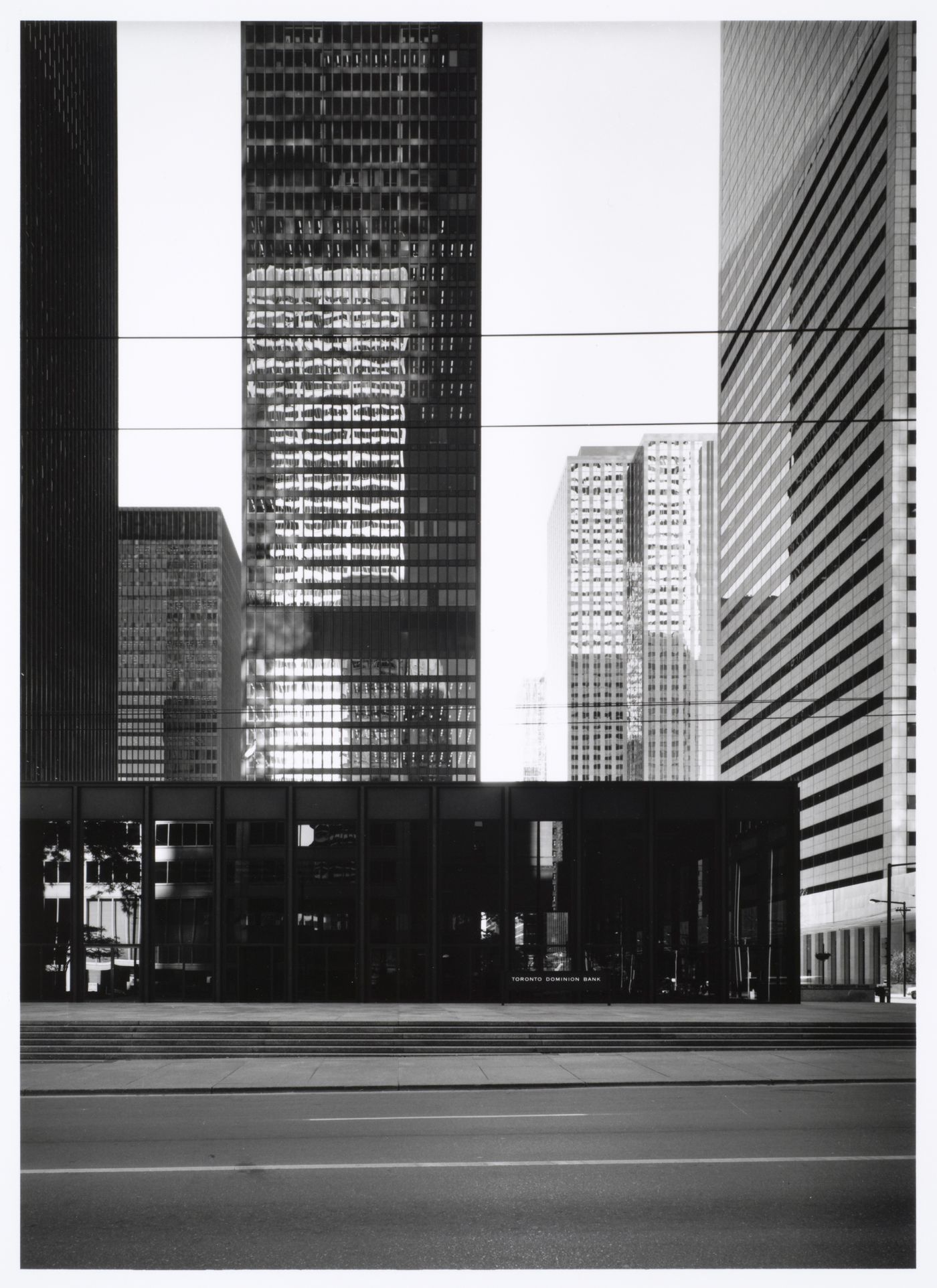 Exterior view of the Toronto-Dominion Bank Pavilion, the Toronto-Dominion Bank Tower and the Royal Trust Tower at 6:30 p.m., Toronto