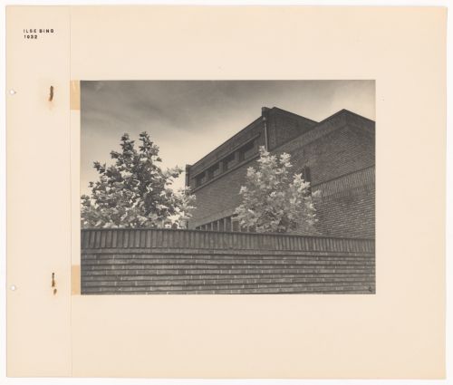View of a brick building, a wall and trees in the New Jewish Cemetery [Neuer Jüdischer Friedhof], Frankfurt am Main, Germany