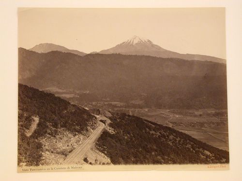 View of the Cumbres de Maltrata showing a railway with the Pico de Orizaba Volcano in the background, Veracruz-Llave, Mexico