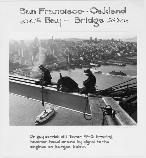Three construction men working on the San Francisco - Oakland Bay Bridge, on steel above water, San Francisco, California