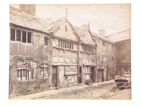 View of dilapidated houses on narrow street, Manchester, England