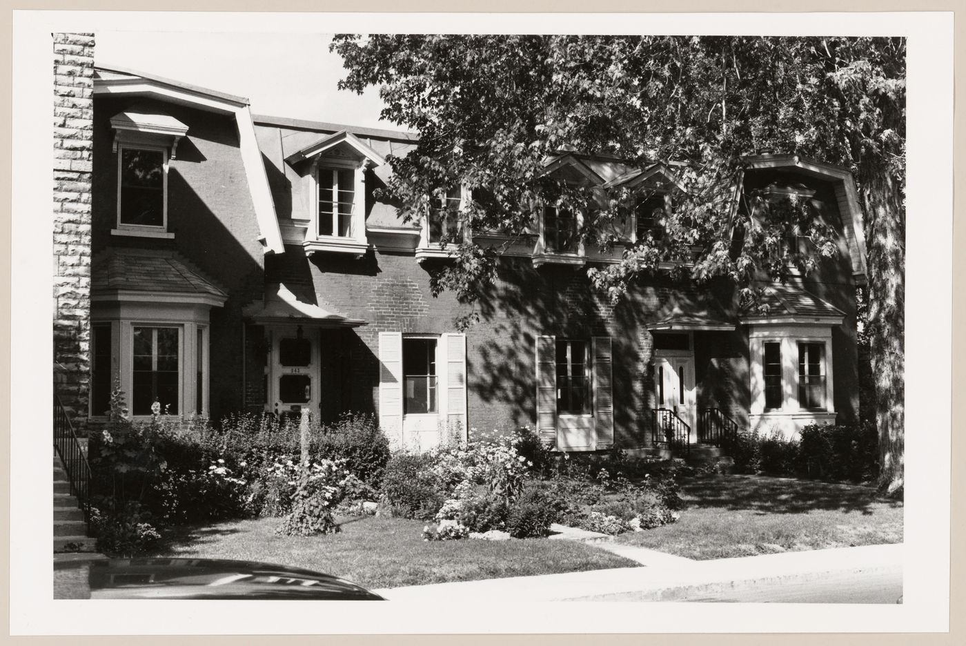 View of the principal façade of a semi-detached house, 339-343 Olivier Avenue, Westmount, Québec