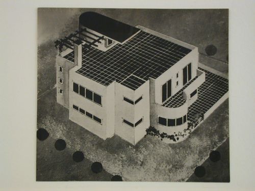 View of a painted drawing showing a house with a tiled veranda, yard and terrace on the roof