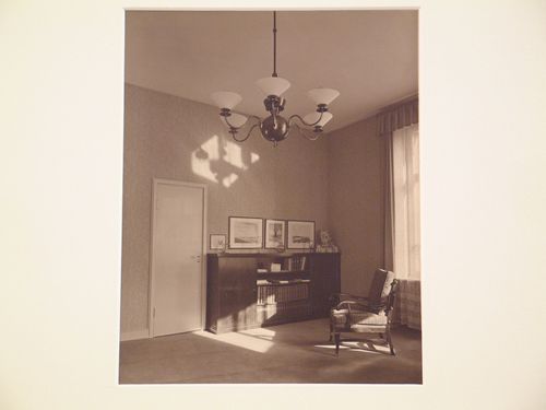 Interior view with chandelier, door, bookcase, and armchair, Germany ?