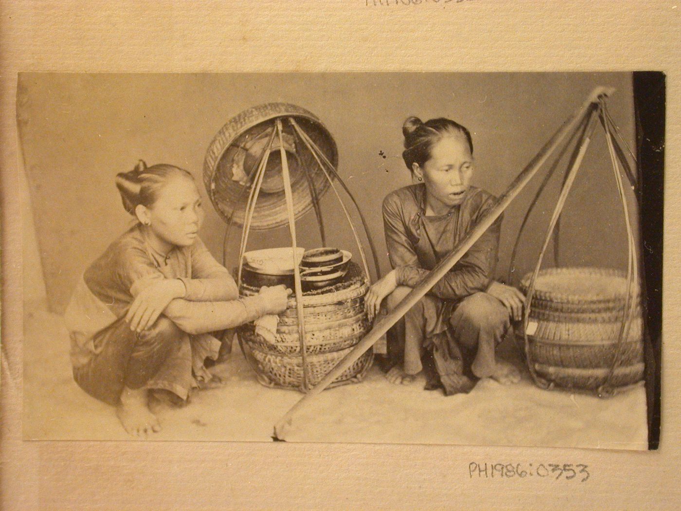 Group portrait of two women, probably in Cochin China (now in Vietnam)