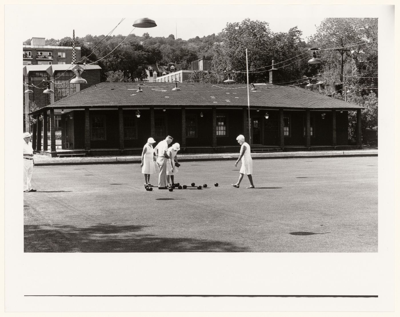 View of Westmount Bowling Green and Clubhouse showing a game underway, between Sherbrooke Street and chemin de la Côte Saint-Antoine, Québec