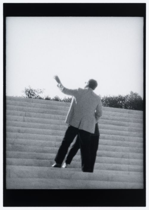 View of two people standing on steps, Washington D.C., United States, from the series "Empire"