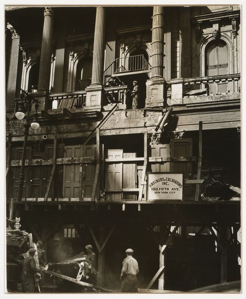 Wrecking crew taking down building, New York City, New York