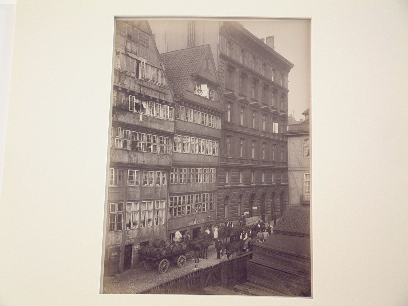 Horse drawn wagons and residences, Hinter den Boden street, Hamburg, Germany