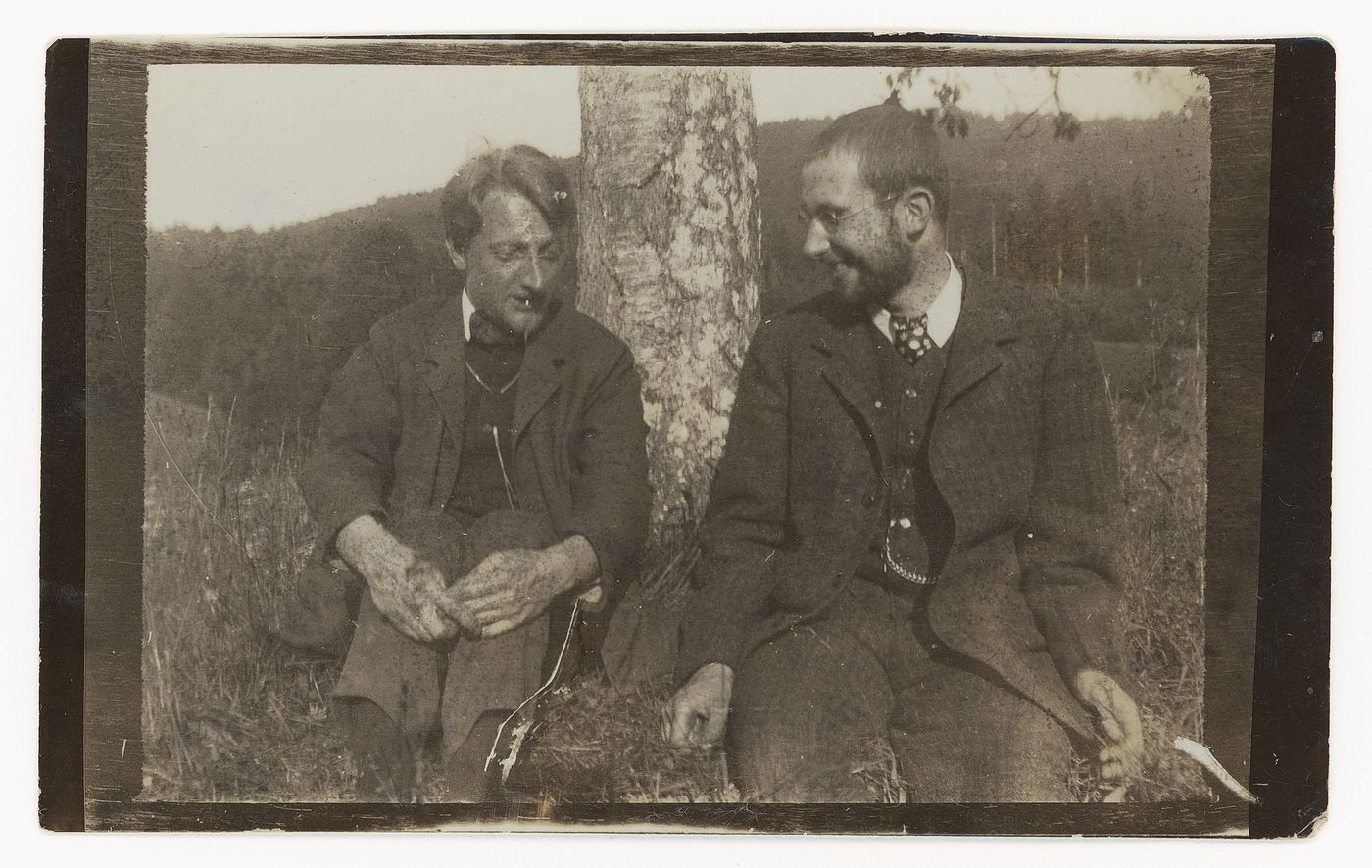 Photograph of Professor Karl Rade and Paul Goesch sitting under a tree, in Dresden