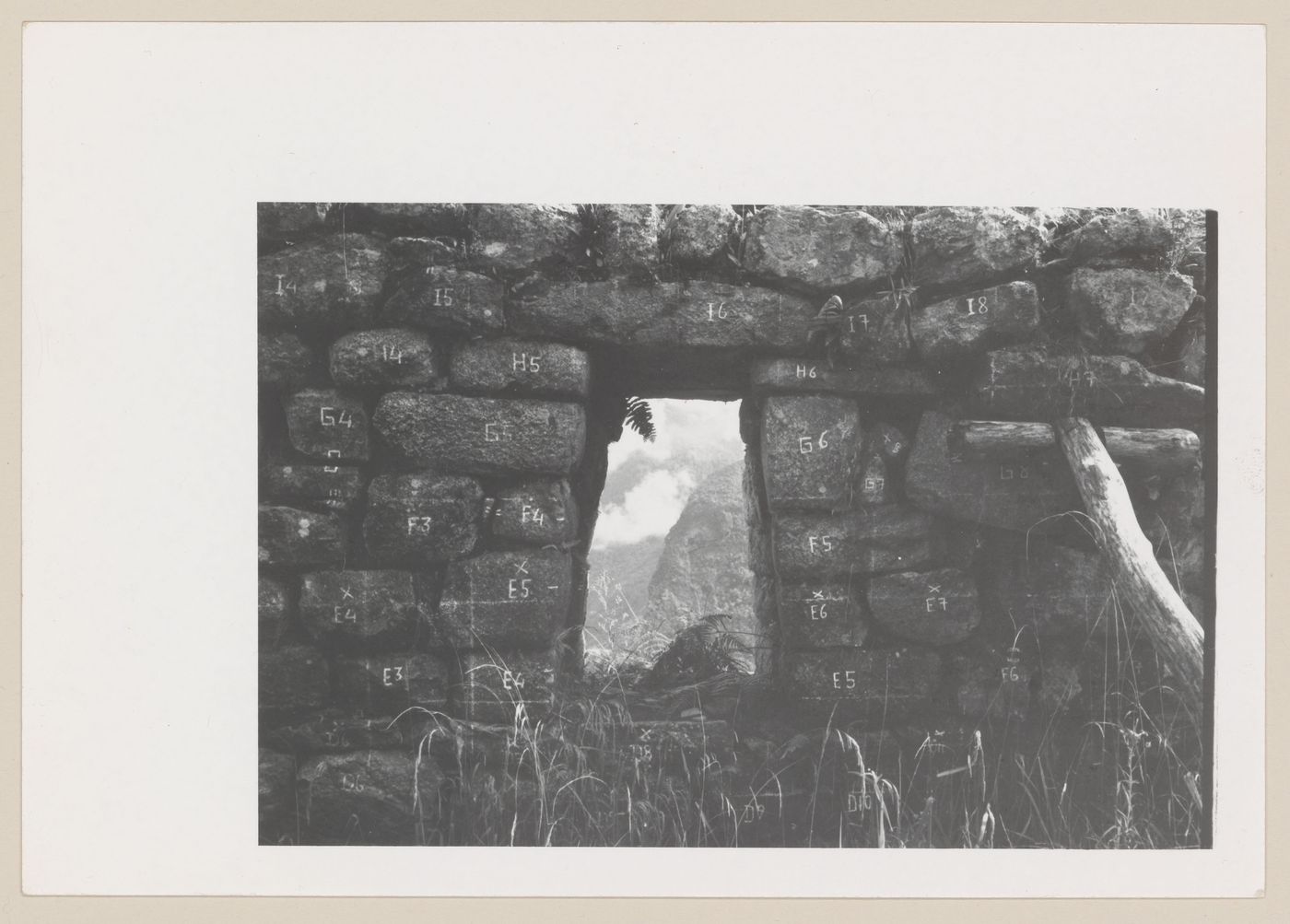 Stones with numbers and doorway, Machu Picchu, Peru