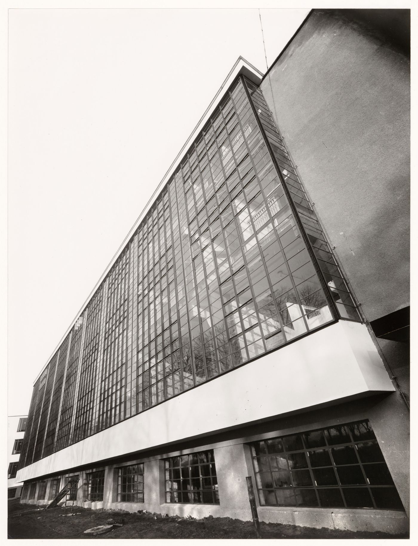 Exterior view of the workshop wing of the Bauhaus building showing a glass curtain wall, Dessau, Germany