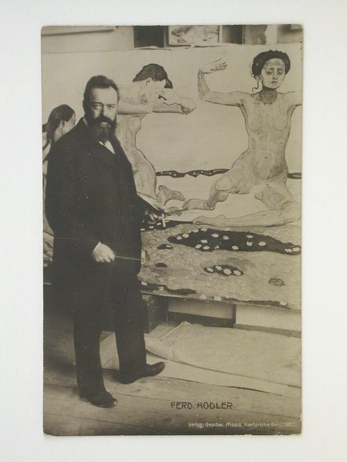 Portrait of Ferdinand Hodler in front of one of his paintings in his studio [?], Geneva [?], Switzerland