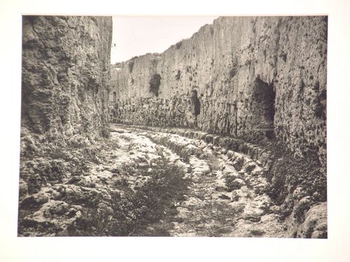 Ancient site, with much-eroded carved stone, Siracusa, Italy