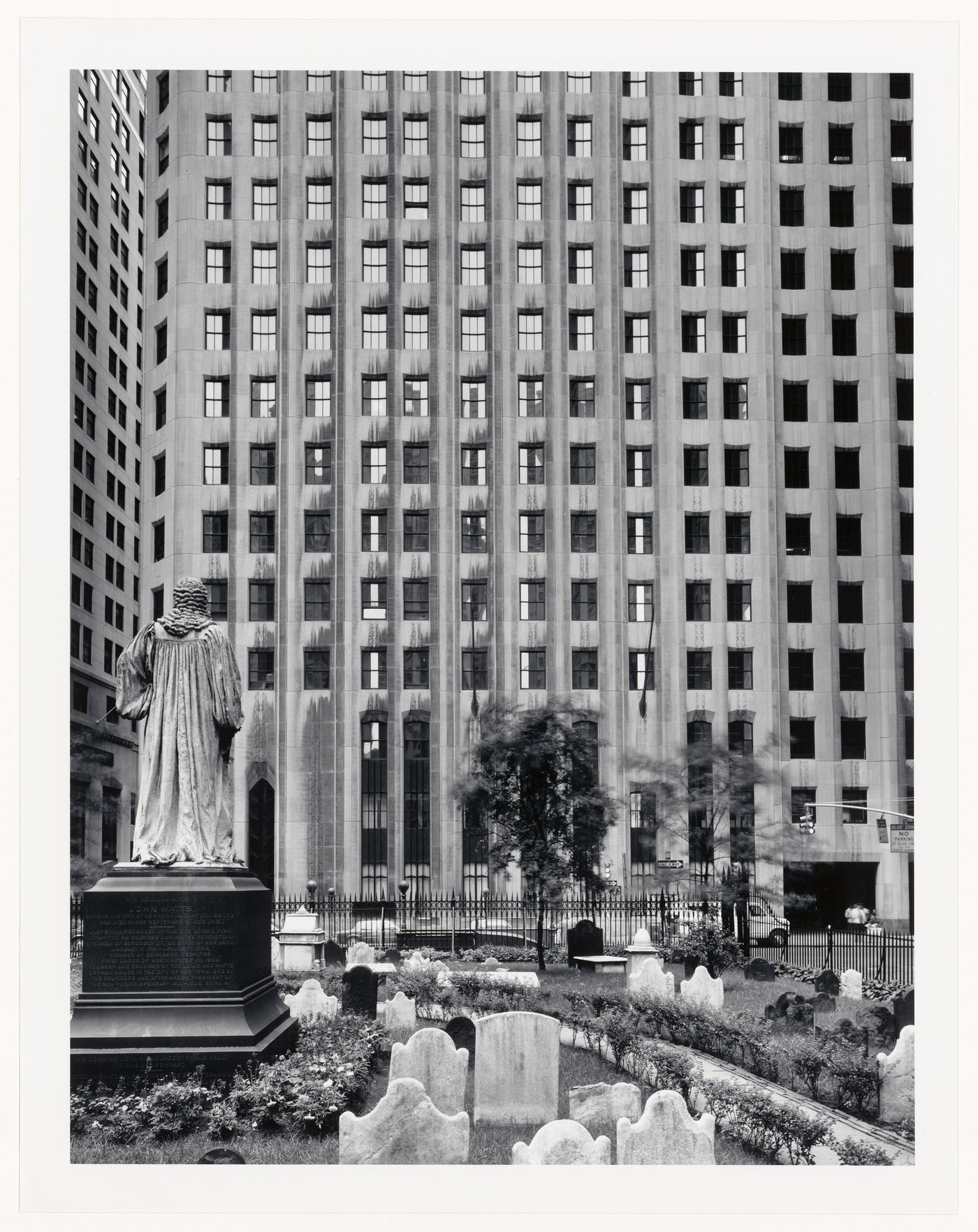 John Watts statue in Trinity Churchyard, looking towards Irving Trust Company and Wall Street, New York City, New York