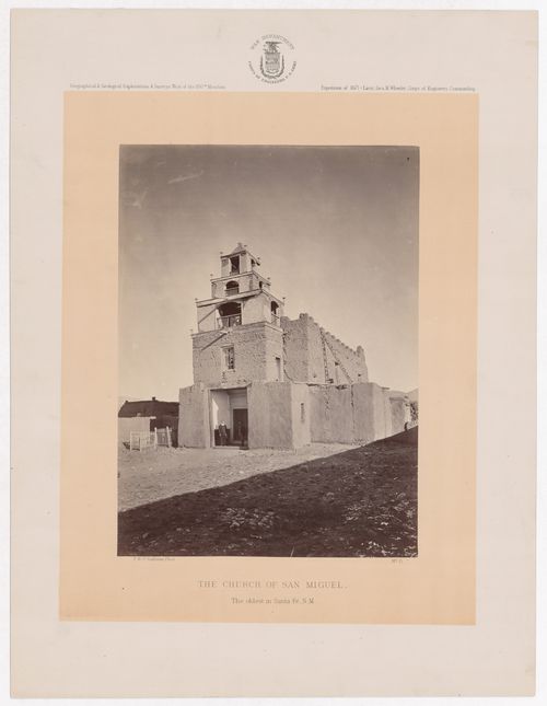 View of the Church of San Miguel with a priest in the doorway, Santa Fe, New Mexico, United States