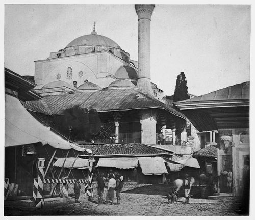 Partial view of the Mihrimah Sultan Camii (also known as the Iskele Camii) with a building and the Scutari Fountain (now the Üsküdar Fountain) in the foreground, Constantinople (now Istanbul), Ottoman Empire (now in Turkey)