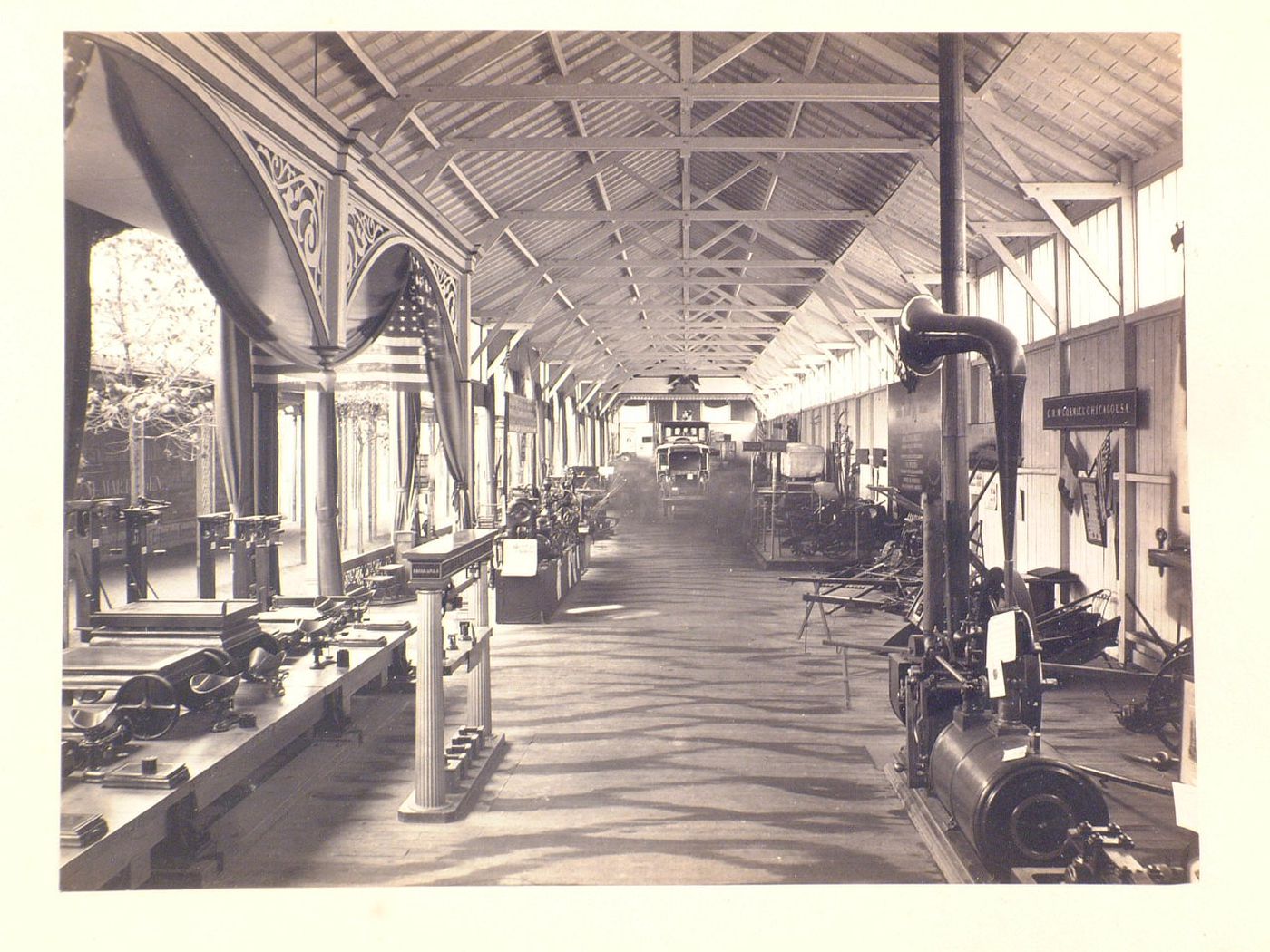 Exposition universelle de 1867 Paris: Interior of exhibition hall containing miscellaneous mechanical devices, France