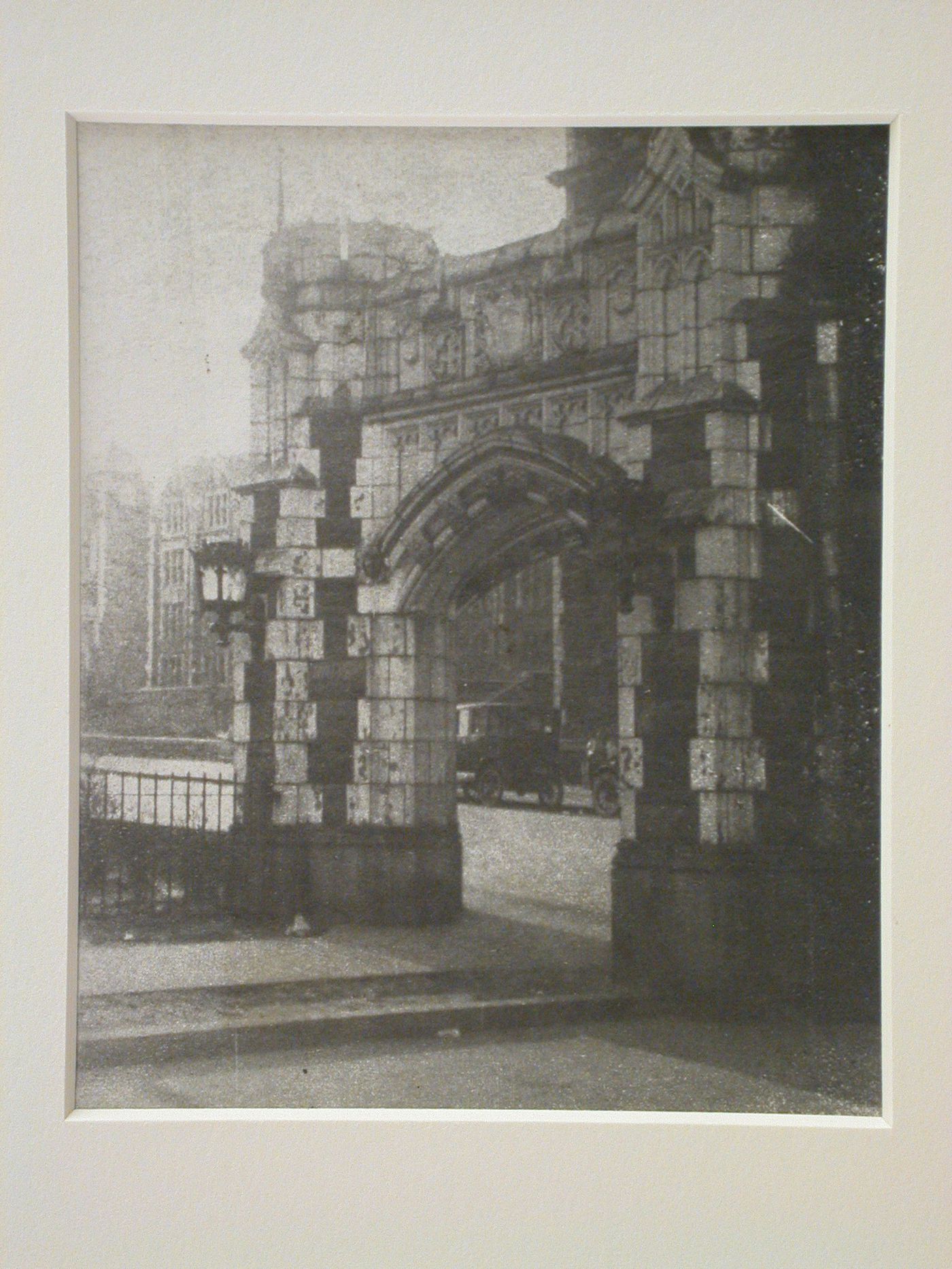 View looking through stone arched gateway to street, New York City, New York