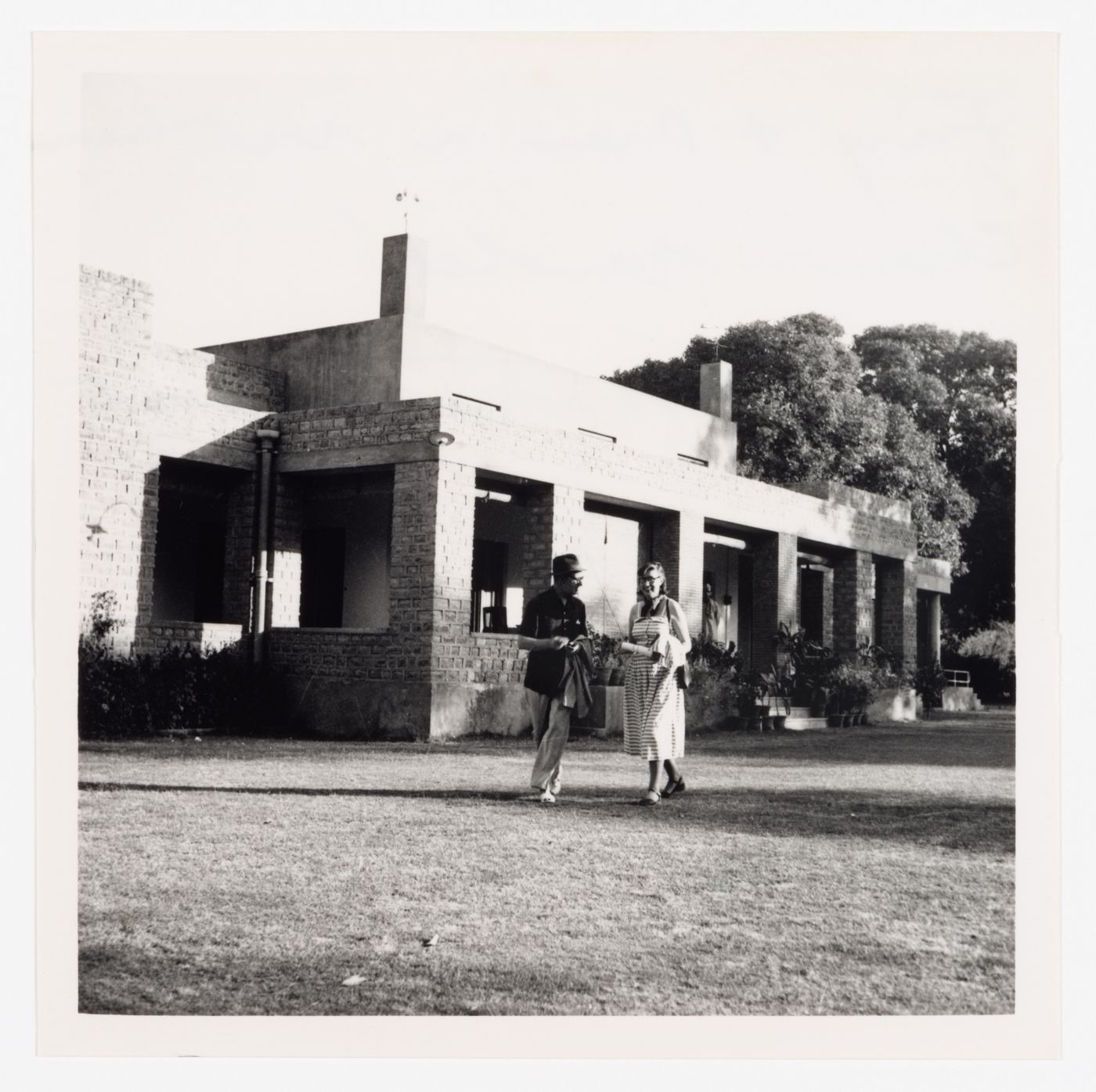 Maxwell Fry and Jane Drew in front of a house in Chandigarh, India