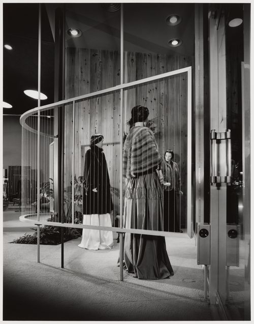 Interior view of Ohrbach's store with mannequins wearing fur coats and wraps, Prudential Square, Los Angeles, California, United States