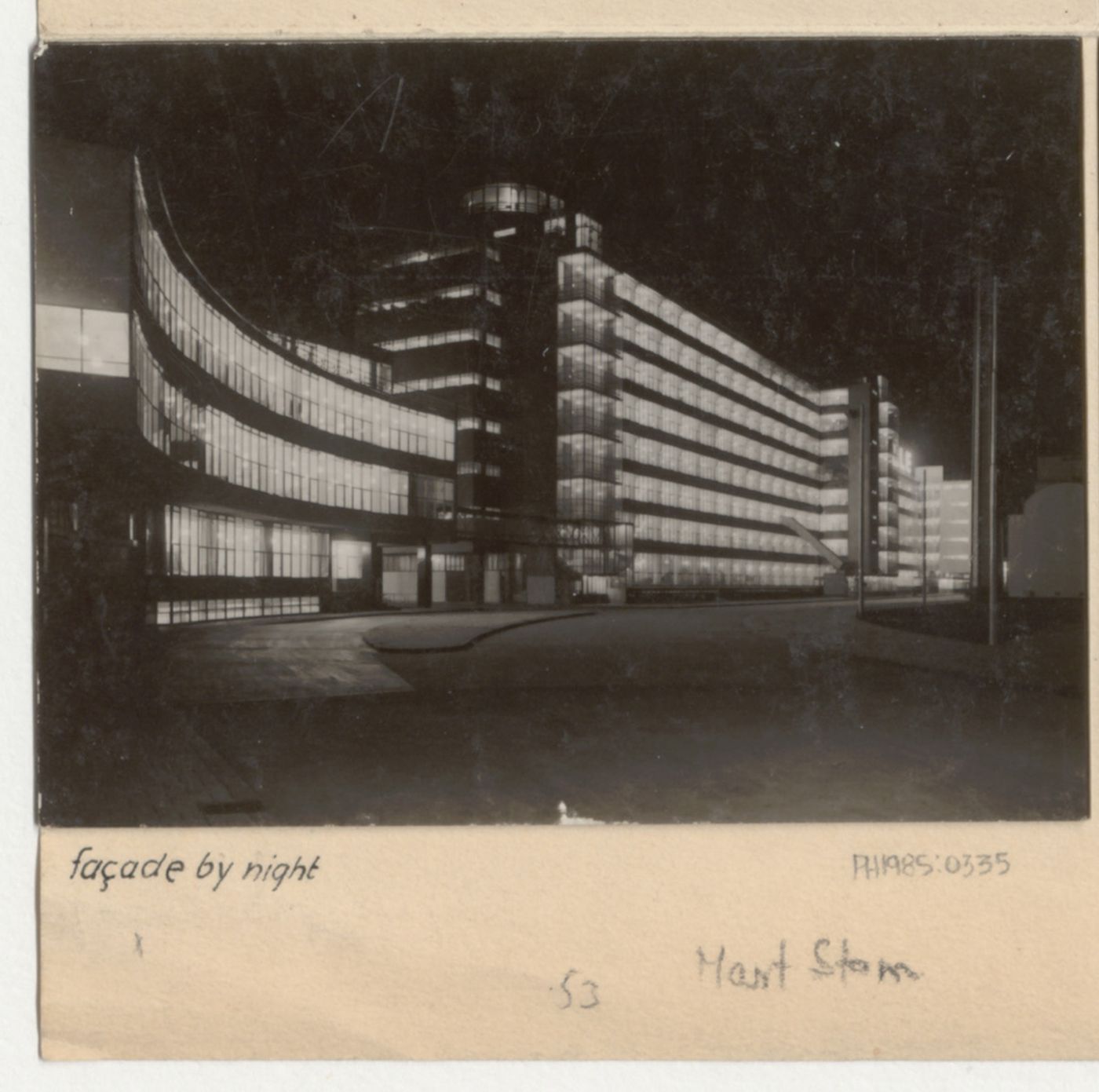 Exterior view of the Van Nelle Factory showing the illuminated office buildings at night, Rotterdam, Netherlands