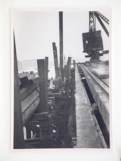 View of construction of a dock, from dock platform