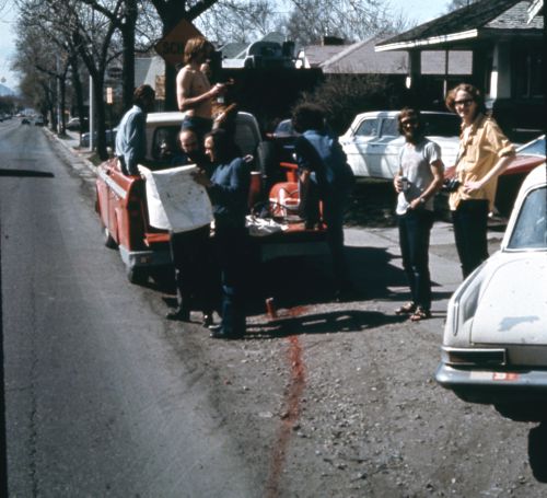 Photograph of students with truck during performance of Red Line