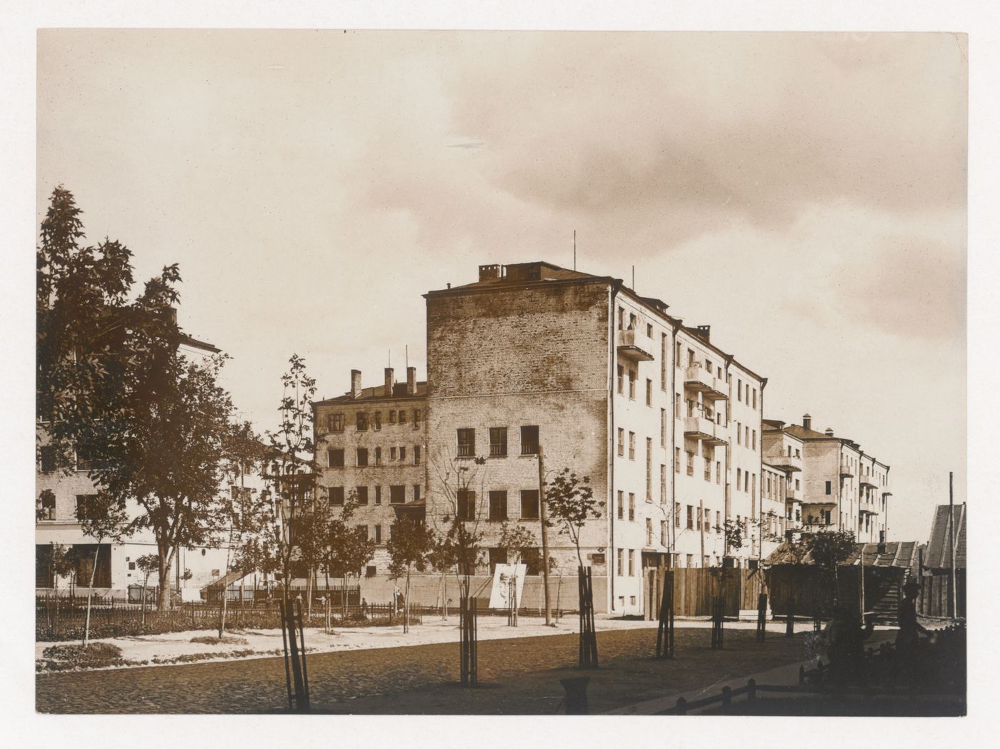 View of housing in the Usachevka complex showing a large poster of one of the seven pilots involved in the Cheluskin shipwreck evacuation on one of the building walls, Moscow