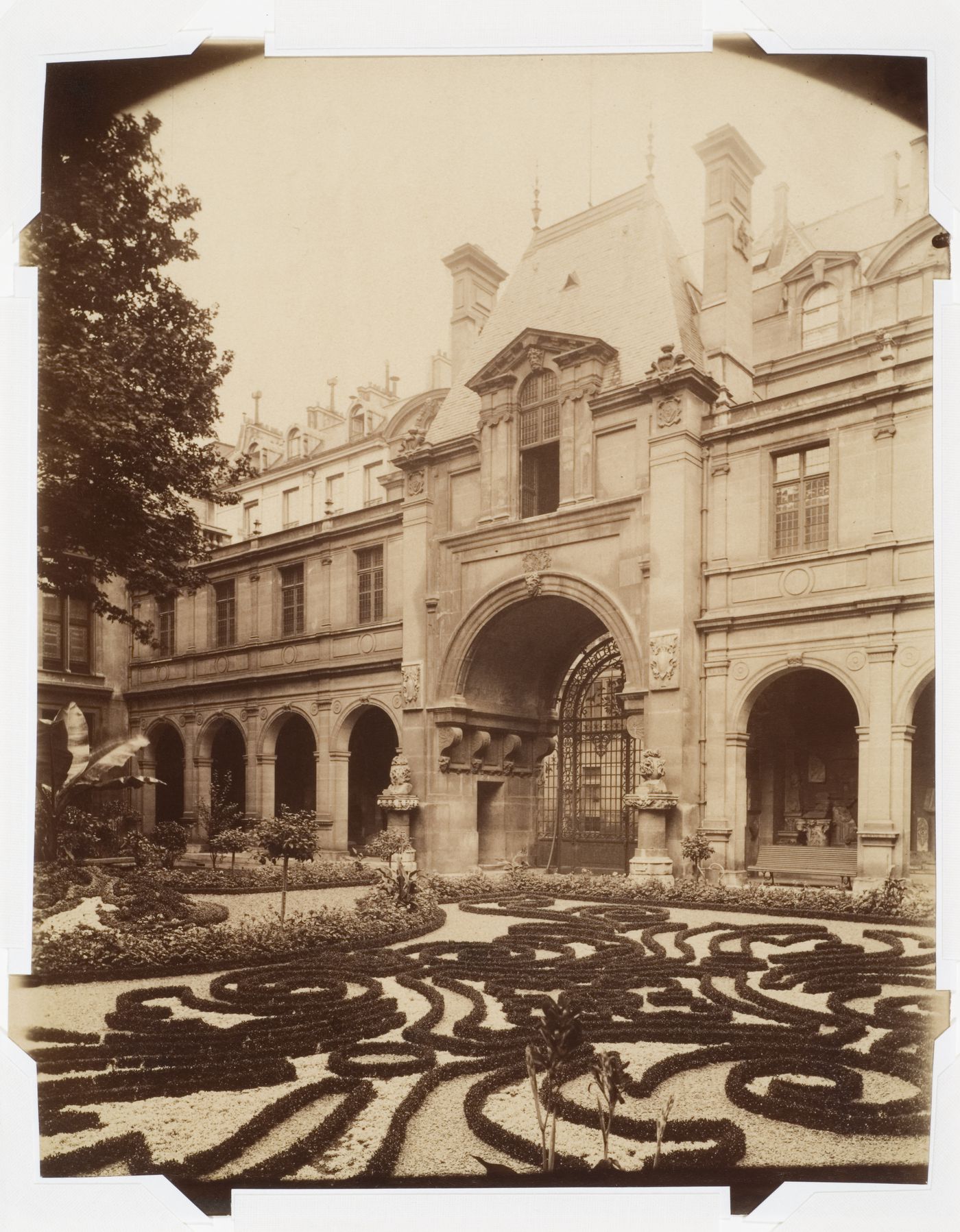 Garden of the Musée Carnavalet, rue des Francs-Boigeois, looking toward the 16th century arch of Nazareth, from the north, Paris, France