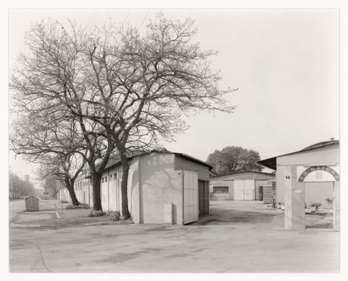 View of warehouses [?] and a gateway, P.M. Natura, via dell'electricità at via delle machinne, Marghera, Italy