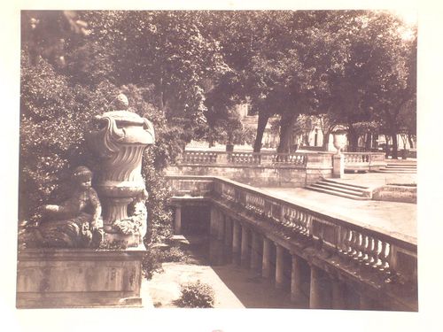 Partial view of Roman nymphaeum with decorative urn by Pierre-Hubert Larchevêque added in the 18th century, Jardin de la Fontaine, Nîmes, Gard, France