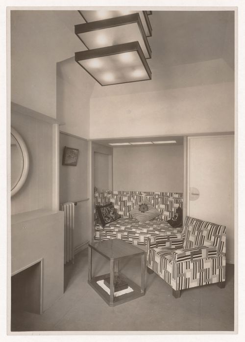 Interior view of living room in Hugo Gaertner's apartment, partially showing fireplace, rue Ampère in the 17th arrondissement, Paris, France