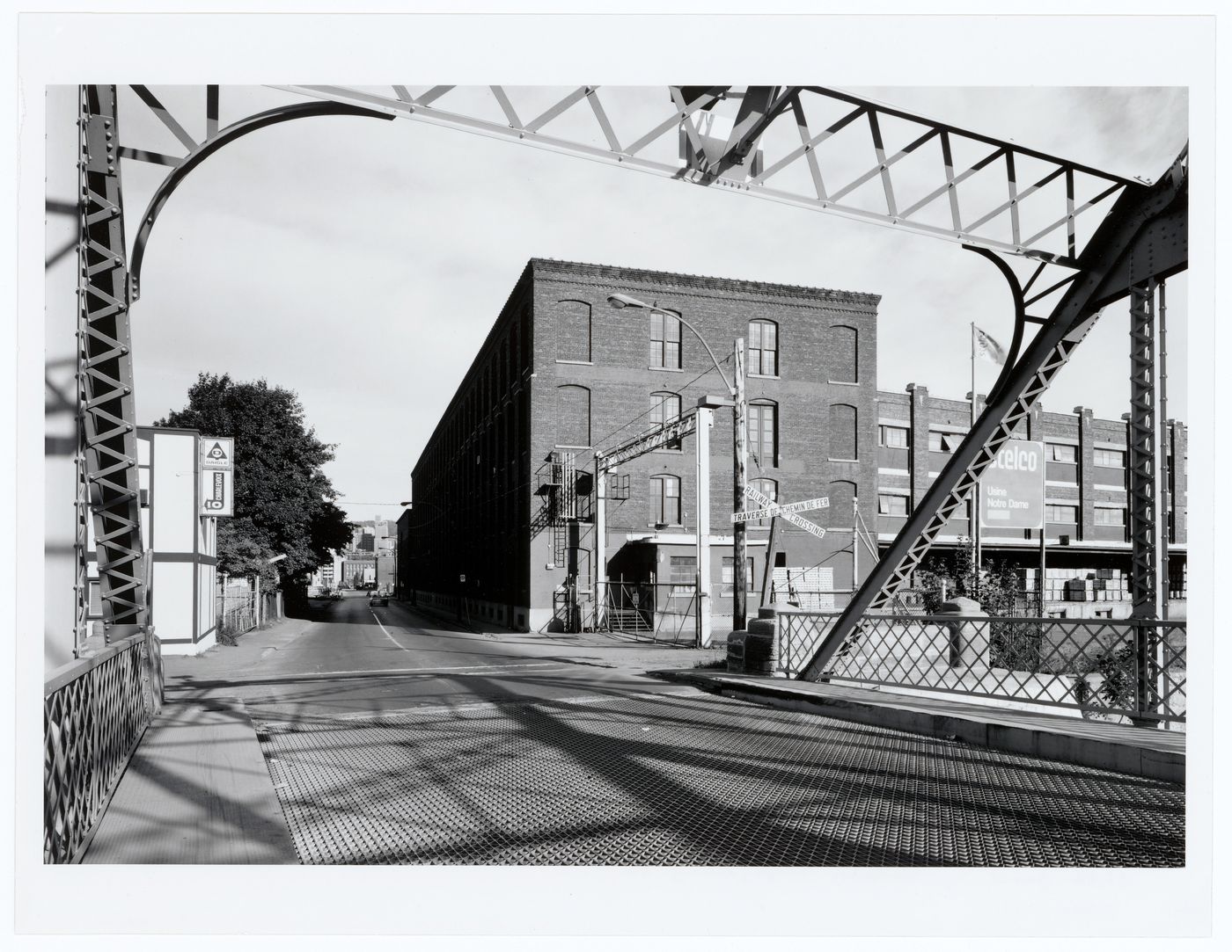 View of the Stelco Inc. industrial complex framed by the Charlevoix Bridge, Montréal, Québec