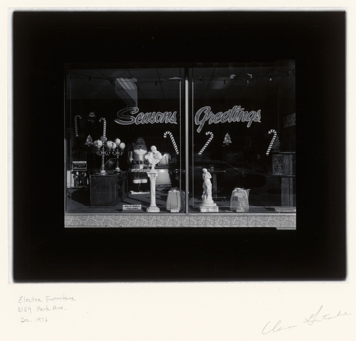 View of a display window of the Electra Furniture store showing Christmas decorations, 5159 avenue du Parc, Montréal, Québec