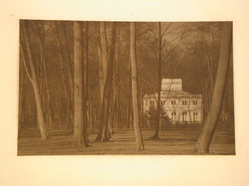 Distant view of the White Cottage, also known as the White House, Lazienki Park, Warsaw, Poland
