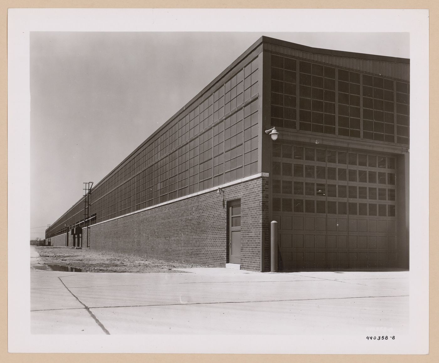 View of the south and east façades of the Press Shop [?], Chrysler Corporation Jet Engine Plant (now the Daimler Chrysler-Warren Truck Plant), Mound and 9 Mile Roads, Sterling Heights, Michigan
