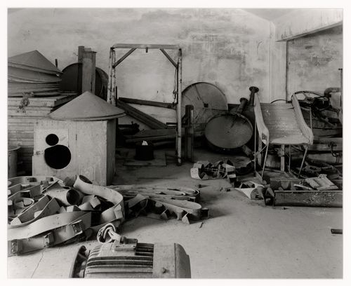 Interior view of a room showing scrap metal, Malteria Adriatica, Marghera, Italy