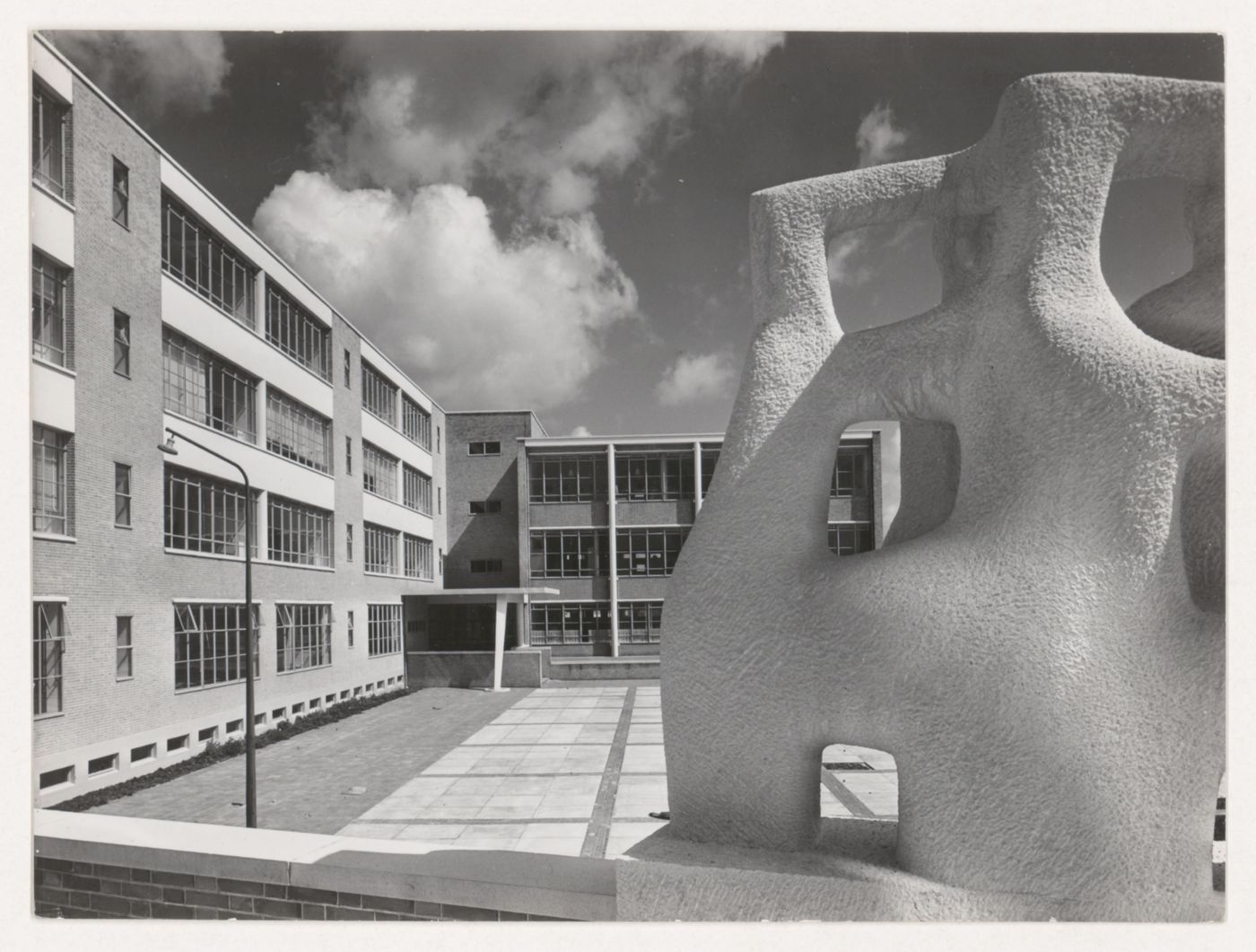 View of the principal façade of the Second Liberal Christian Lyceum showing a sculpture, The Hague, Netherlands