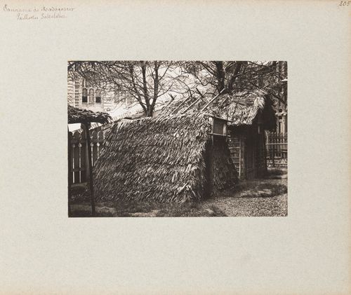 View of Sakalava houses on grounds of Pavillon de Madagascar, Exposition universelle, 1900, Paris, France