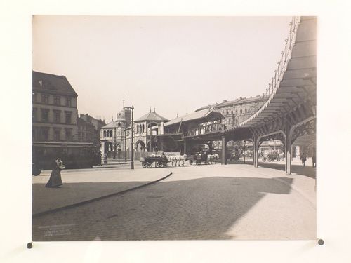 Worm's-eye view of the elevated railway system and connecting building