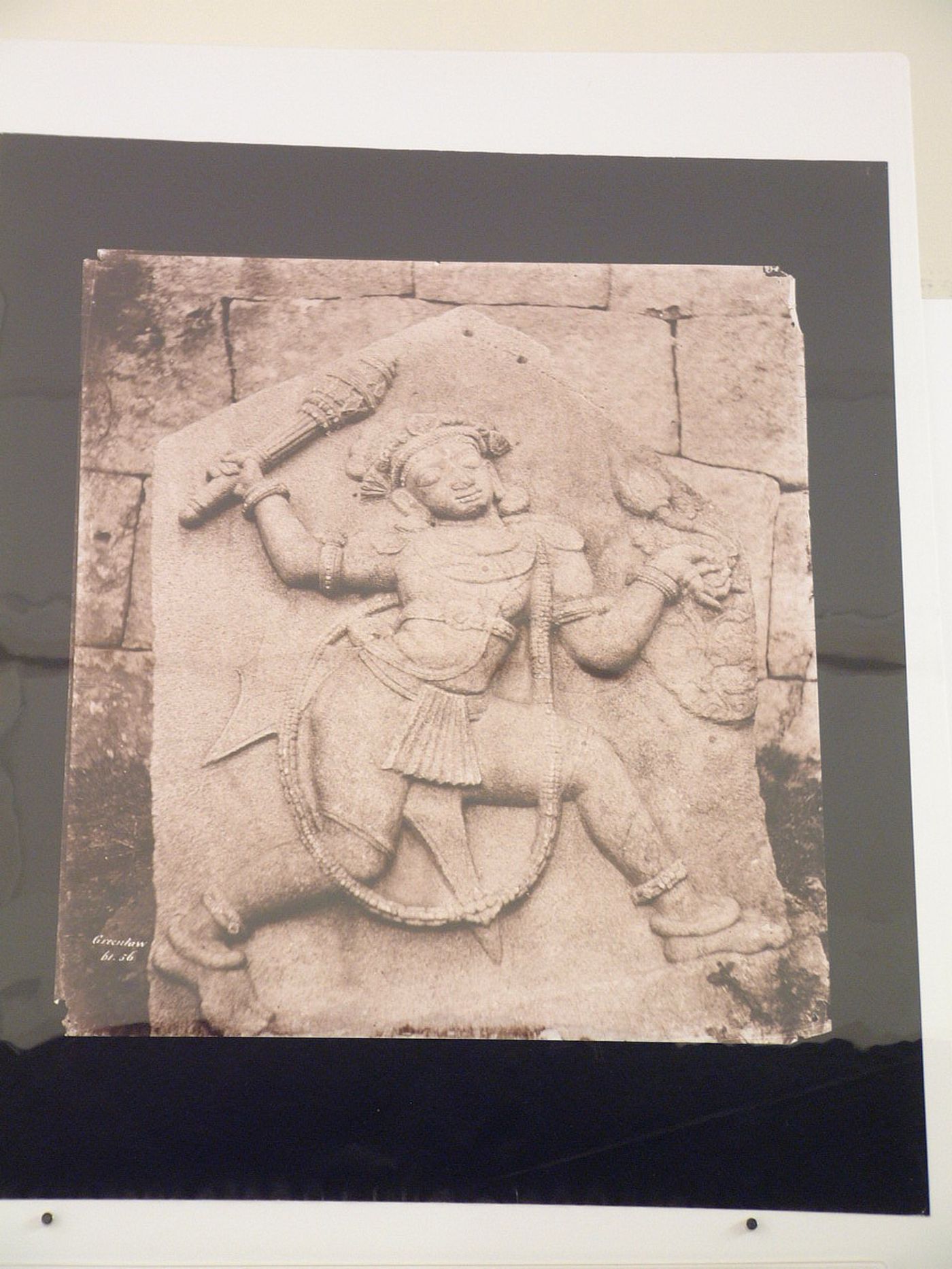Close-up view of a fragment of stone with a bas-relief depicting the mythological figure Bhima, Bhima's Gate, Vijayanagara, Hampi, India