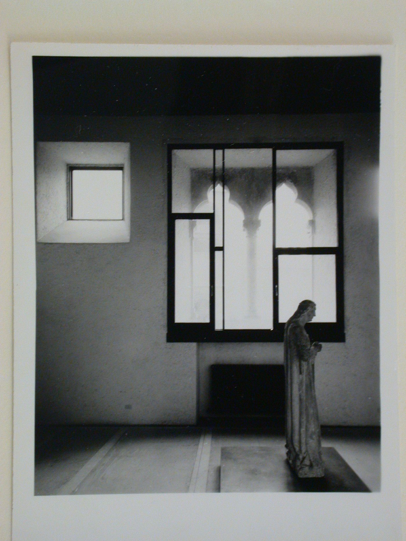 Interior view of a gallery showing a statue and windows, Museo di Castelvecchio, Verona, Italy
