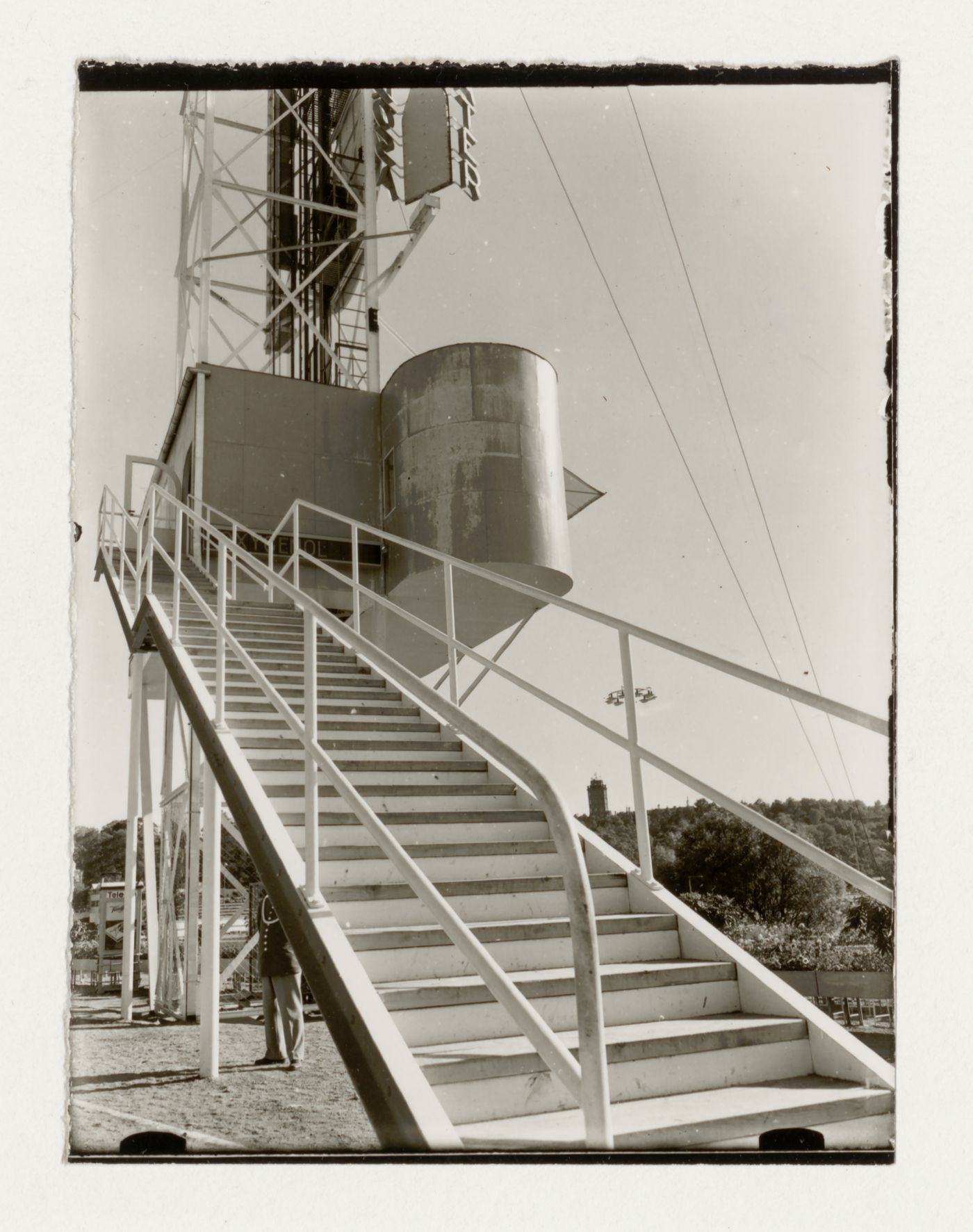 Exterior view of the base of the advertising mast at the Stockholm Exhibition of 1930 showing the stairs, Stockholm