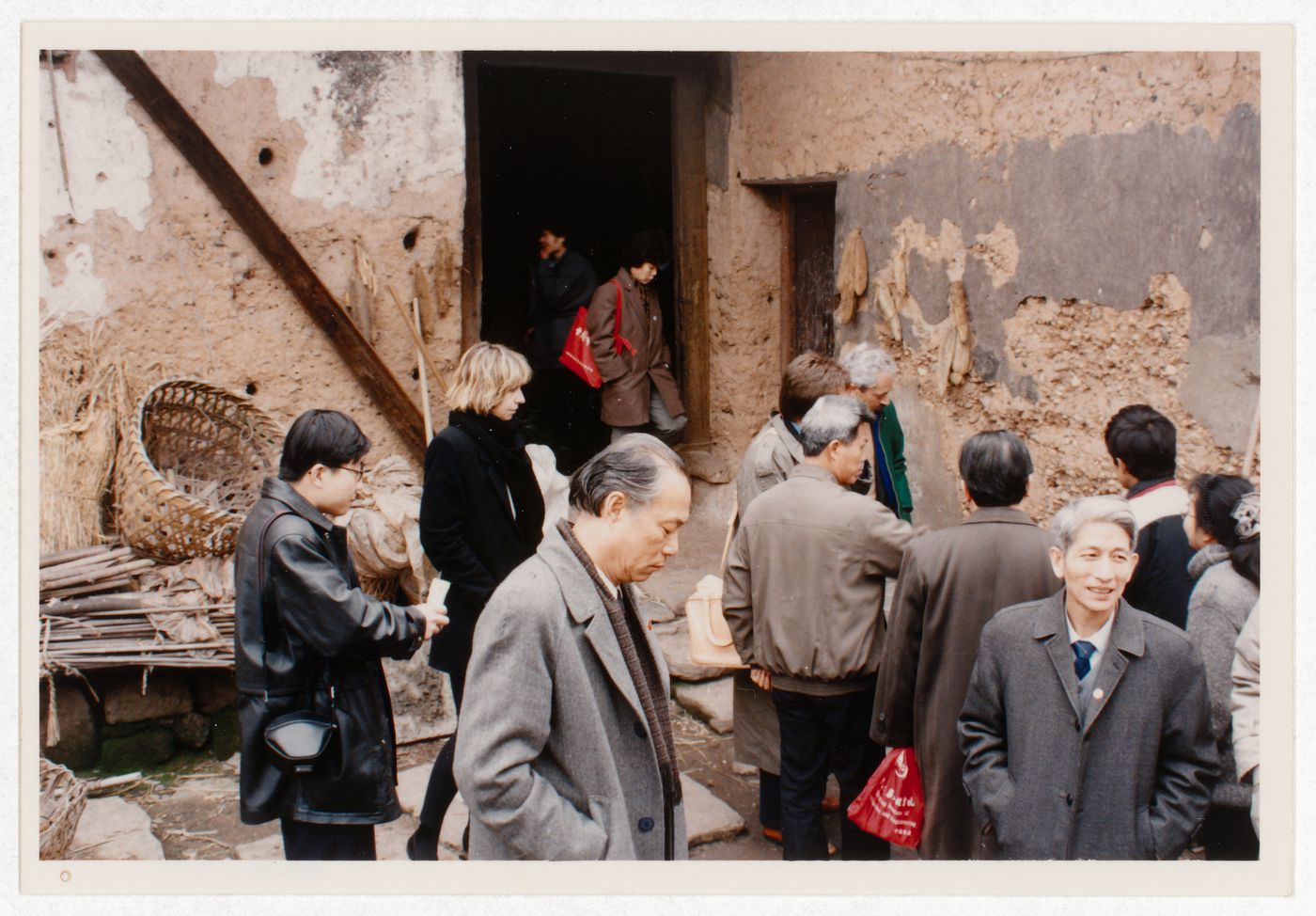 Participants of the "Rural Housing: A First Step to Market Housing" international workshop during site visit