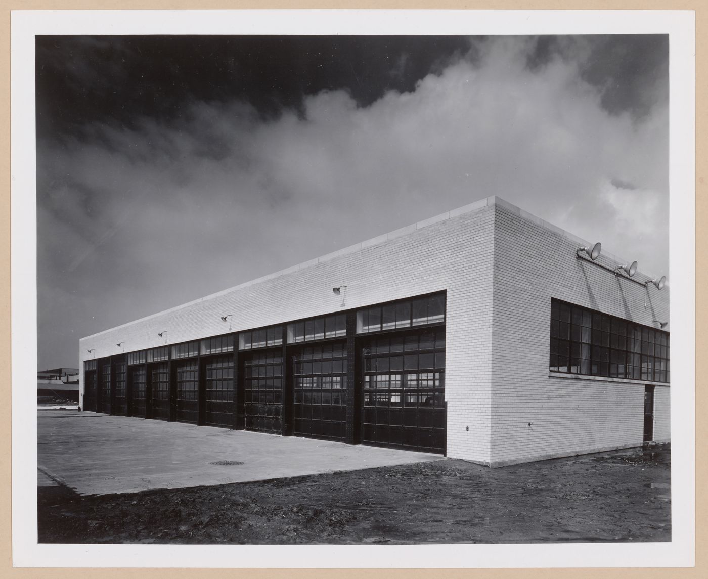 View of the principal façade of a garage of the Buffalo Airport Assembly Plant, Curtiss-Wright Corporation Airplane division, Buffalo, New York