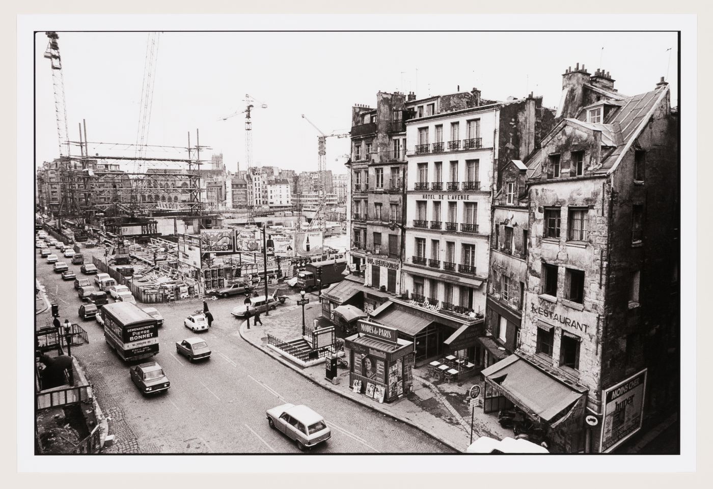 View of Rue Beaubourg with construction of Centre Georges Pompidou in background, Paris