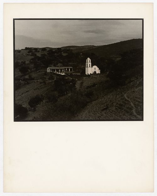 View of a church, a building and hills, Mexico