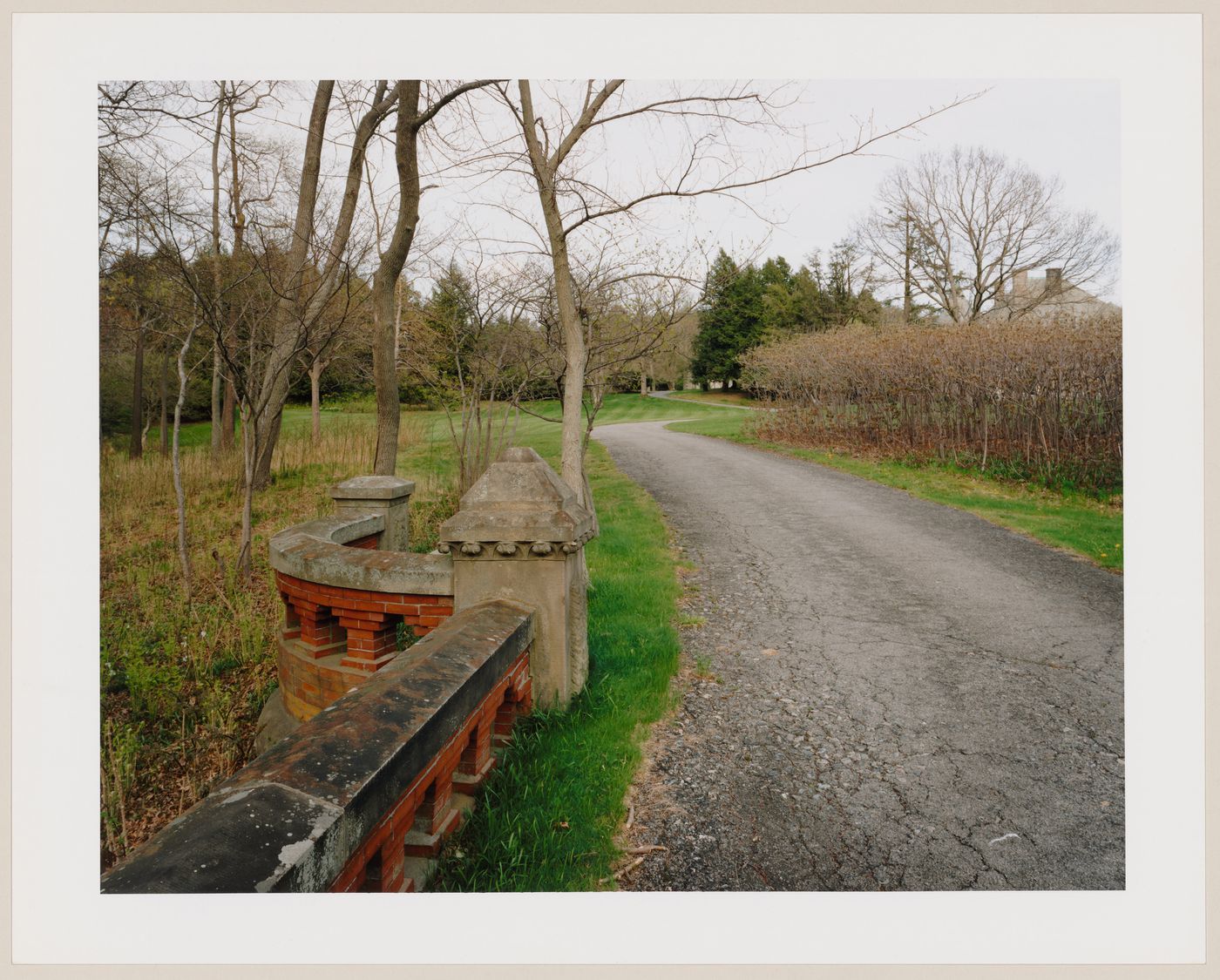 Viewing Olmsted: View of the house from the bridge, Langwater, the Frederick Lothrop Ames Estate, North Easton, Massachusetts