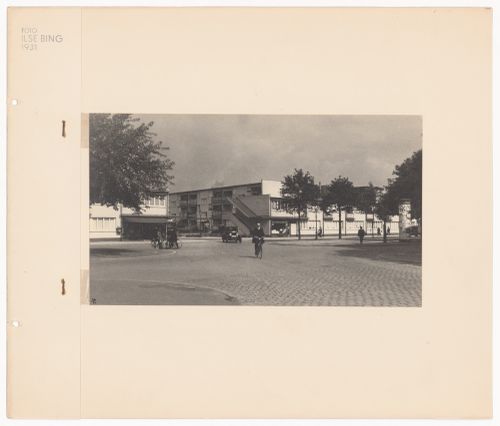 View of a street, a shoemaker's shop and apartment houses in the Hellerhof Housing Estate, Frankfurt am Main, Germany